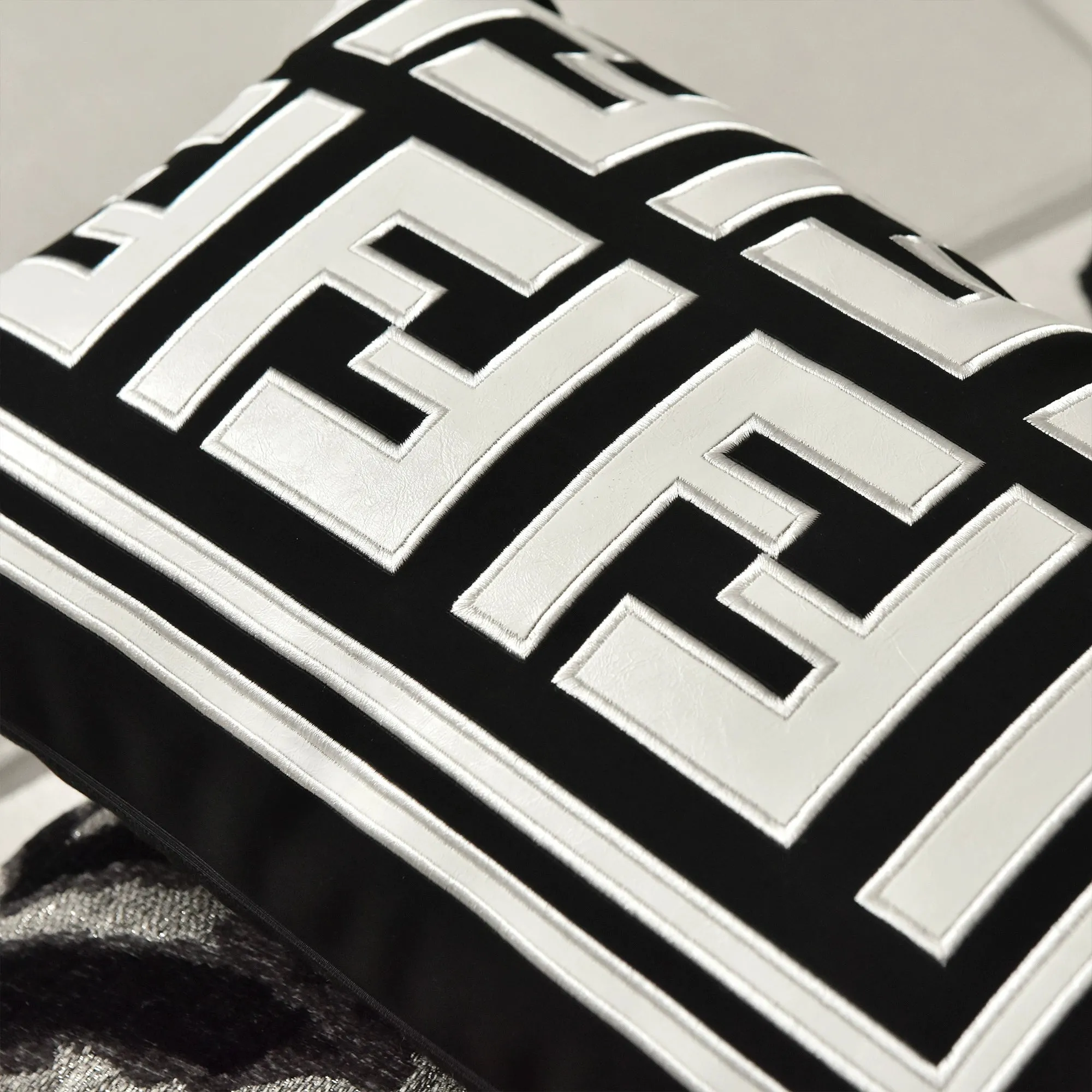 Chic Black and White Orange Accent High-End Cushion