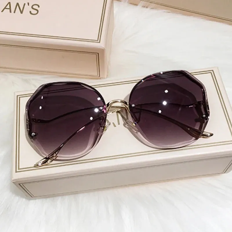 Luxury Round Gradient Sunglasses Women UV400 Metal Temples