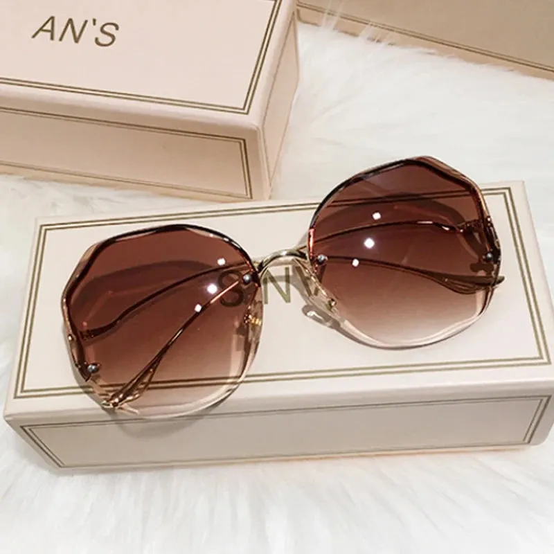 Luxury Round Gradient Sunglasses Women UV400 Metal Temples